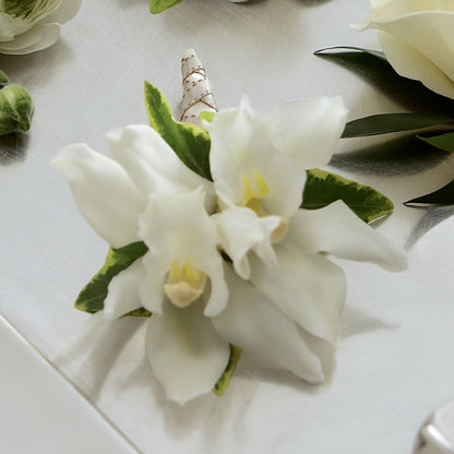 White Mini Cymbidium Boutonniere –  Maplewood Florist, Maplewood NJ